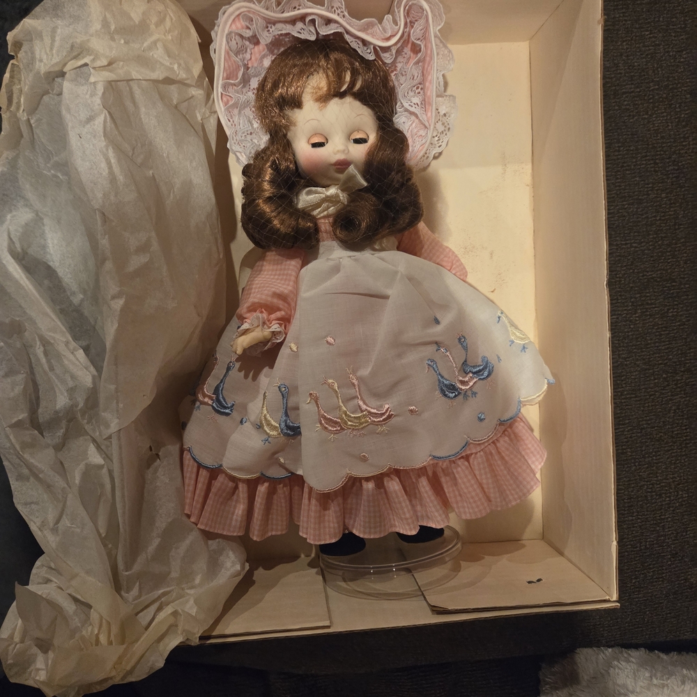 Vintage Porcelain Doll with Pink Dress